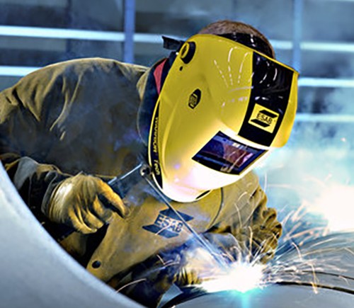 image of a welder with a yellow helmet
