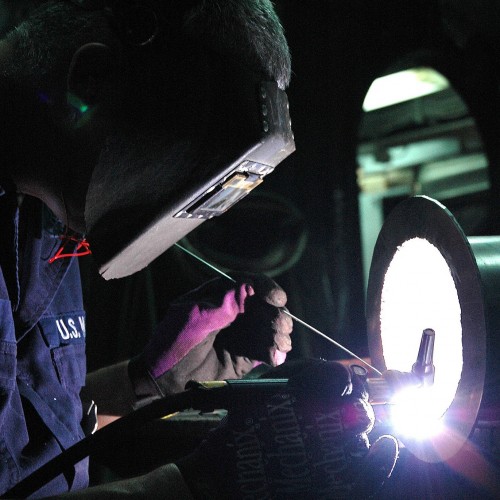 image of a welder wearing ppe