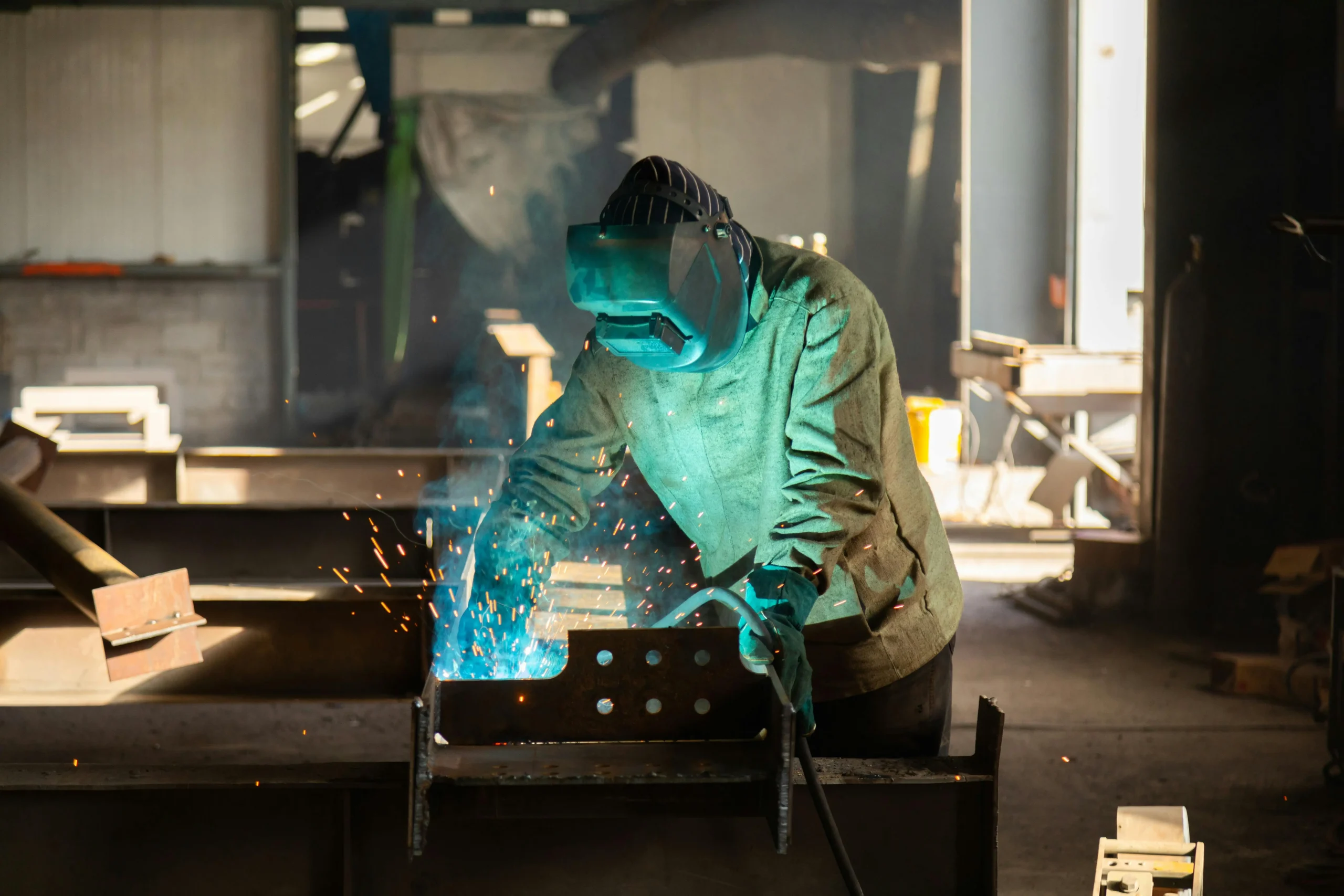 Man in welding suit.